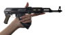 AKS-47 Kalashnikov Assault Rifle , M1947 miniature model in hand