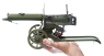 Maxim Heavy Machine Gun, M1910 miniature model in hand