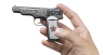 Автоматический пистолет Стечкина миниатюрная модель в руке